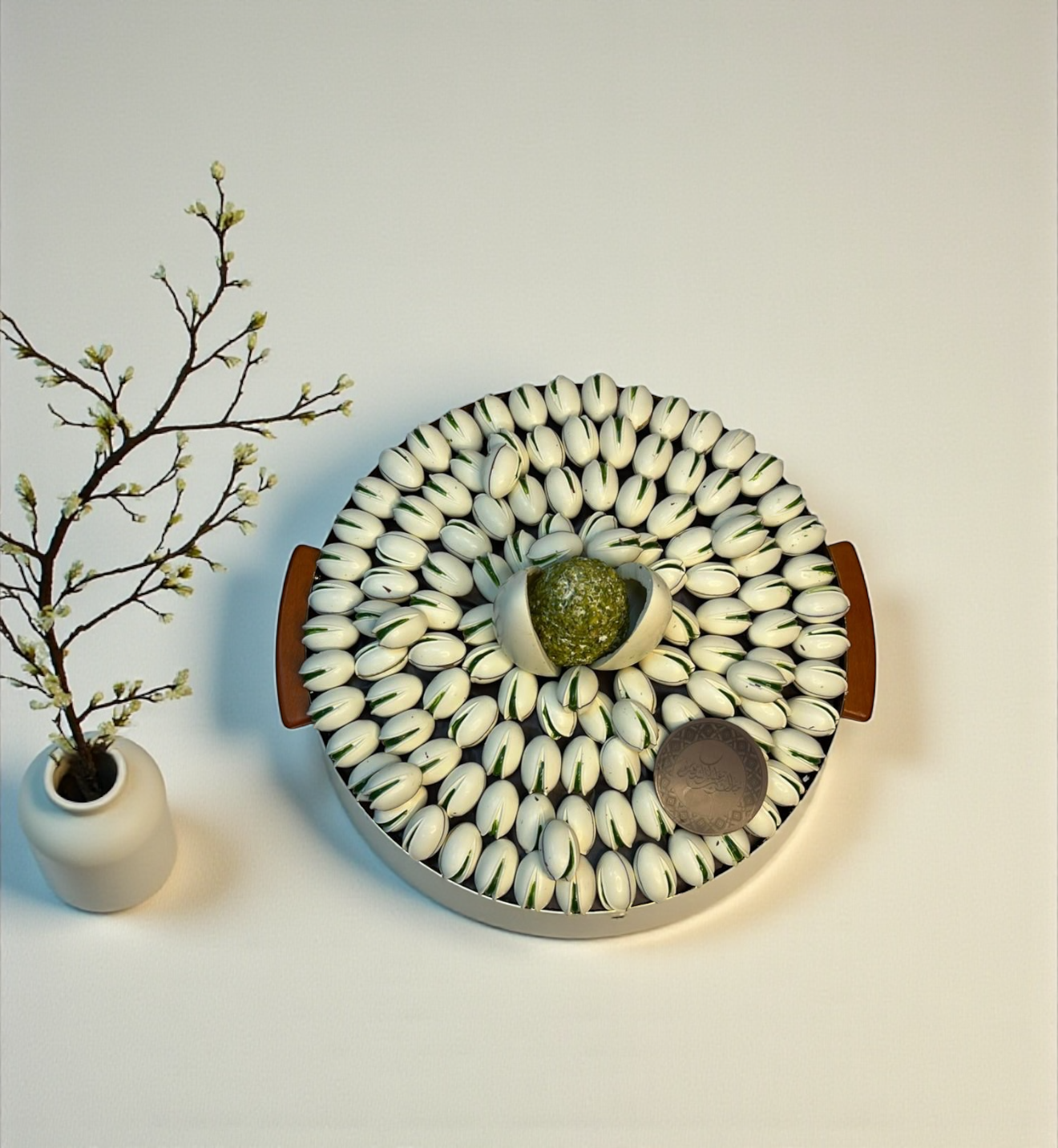 Luxury Stainless Steel Platter — Pistachio Praline, Kunafa & Grand Chocolate Egg صحن ستانلس ستيل فاخر — حبة الفستق والكنافة وبيضة الشوكليت الملكية