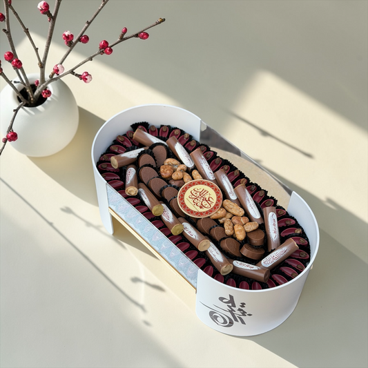 Luxury Oval Acrylic Box – Giovanni Signature Chocolate بوكس اكريليك بيضاوي فاخر مع تشكيلة سيجنتشر من جيوفاني