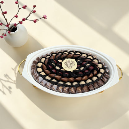 Belgian Chocolate Porcelain Platter with Glass Lid | صحن بورسلين بغطاء زجاجي وحامل ذهبي مع تشكيلة شوكليت بلجيكي